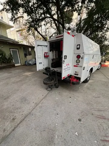 Magnet Plumbing service vehicle on-site for Grease Trap Cleaning in Ponce De Leon Springs